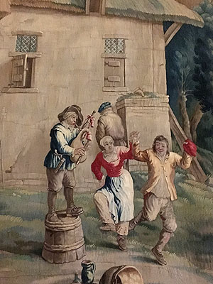 Tanzende Bauern auf einer Tapisserie der Teniers-Serie im großherzoglichen Speisesaal.